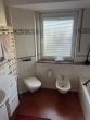 Badezimmer mit Badew. + Bidet - Exklusive 4-Zimmer-Wohnung mit Balkon, Aufzug & zwei Tiefgaragenplätzen in bester Hildener Lage